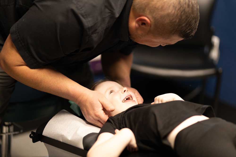 IMG_1864 Kid in chiropractic bed